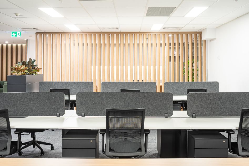 open plan breakout space with timber slatted wall