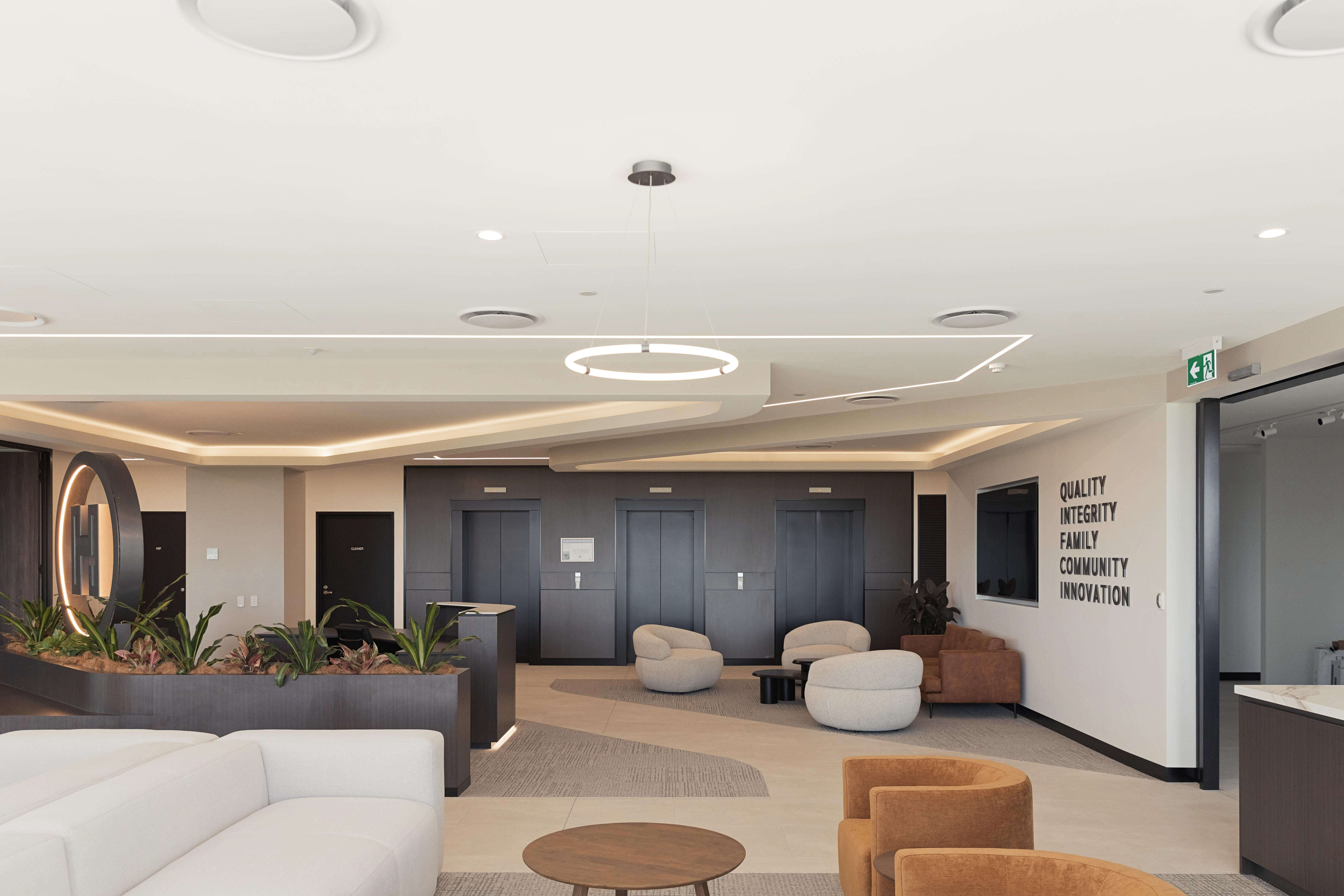 Common seating reception area with elevators at the back